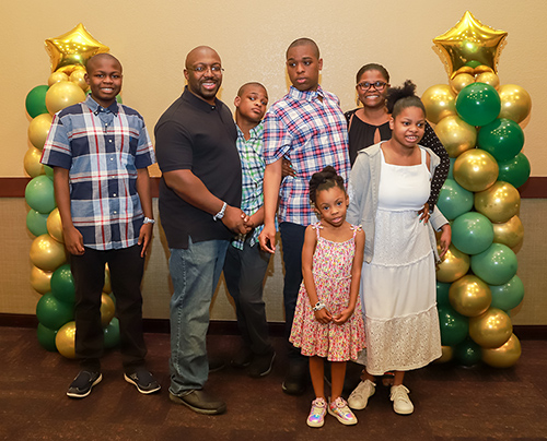 family with balloons