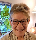 Rachel Kuhr models the play therapy crown her colleagues encourage her to wear as 2021’s Permanency Professional Award recipient.